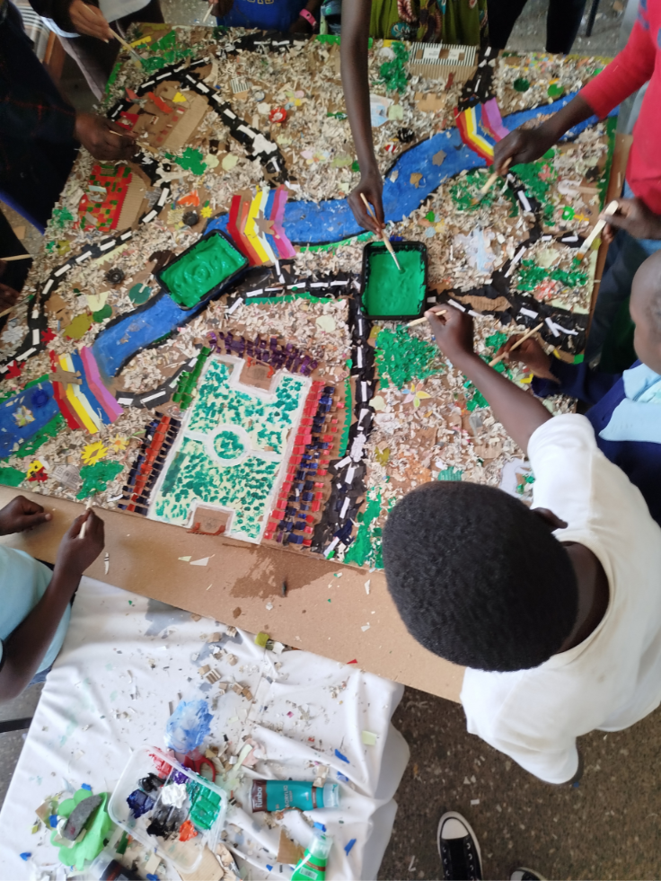 Children collaborating on a community map