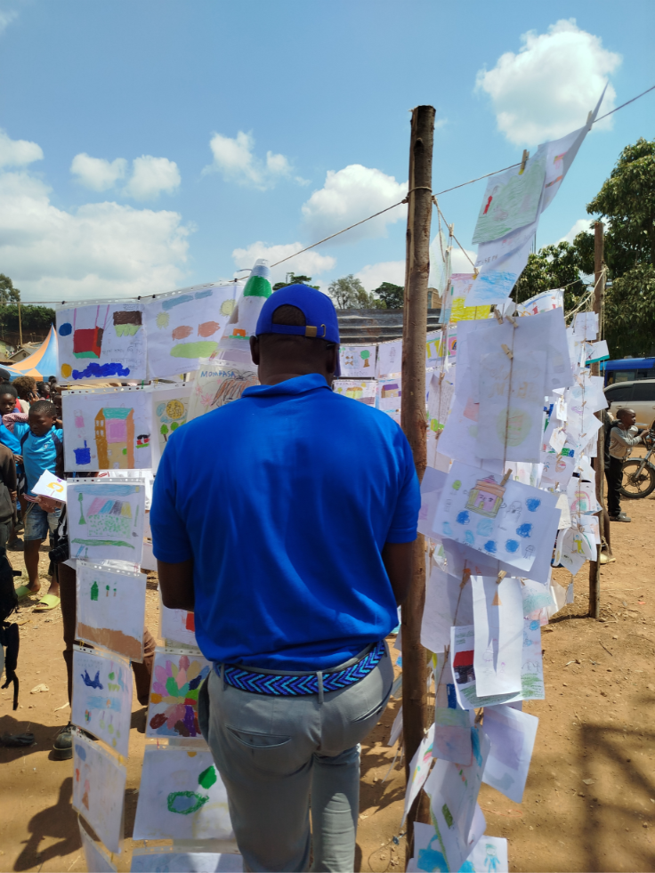 Children's artwork at a community exhibition